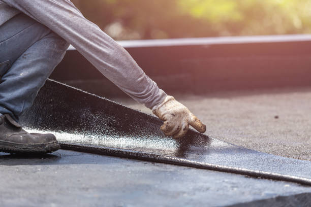 Professional Basement Waterproofing technician working in Deer Lodge, TN